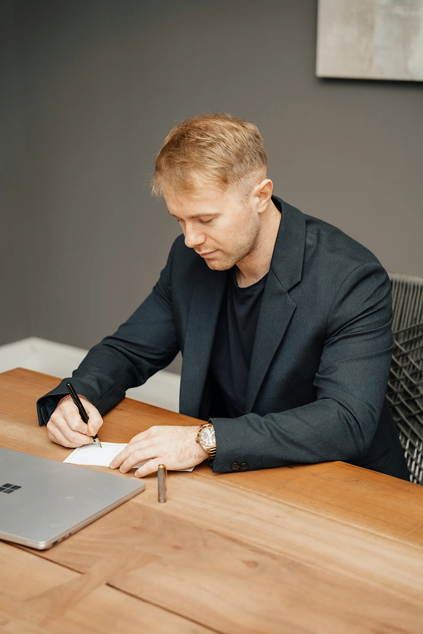 Sergey Yankovskyi reviewing his notes at the office